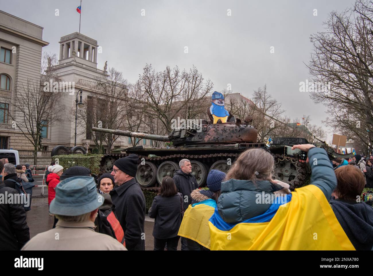 Pro Ukraine demonstration in Berlin with destroyed Russian tank on first anniversary of Russian invasion of Ukraine Stock Photo