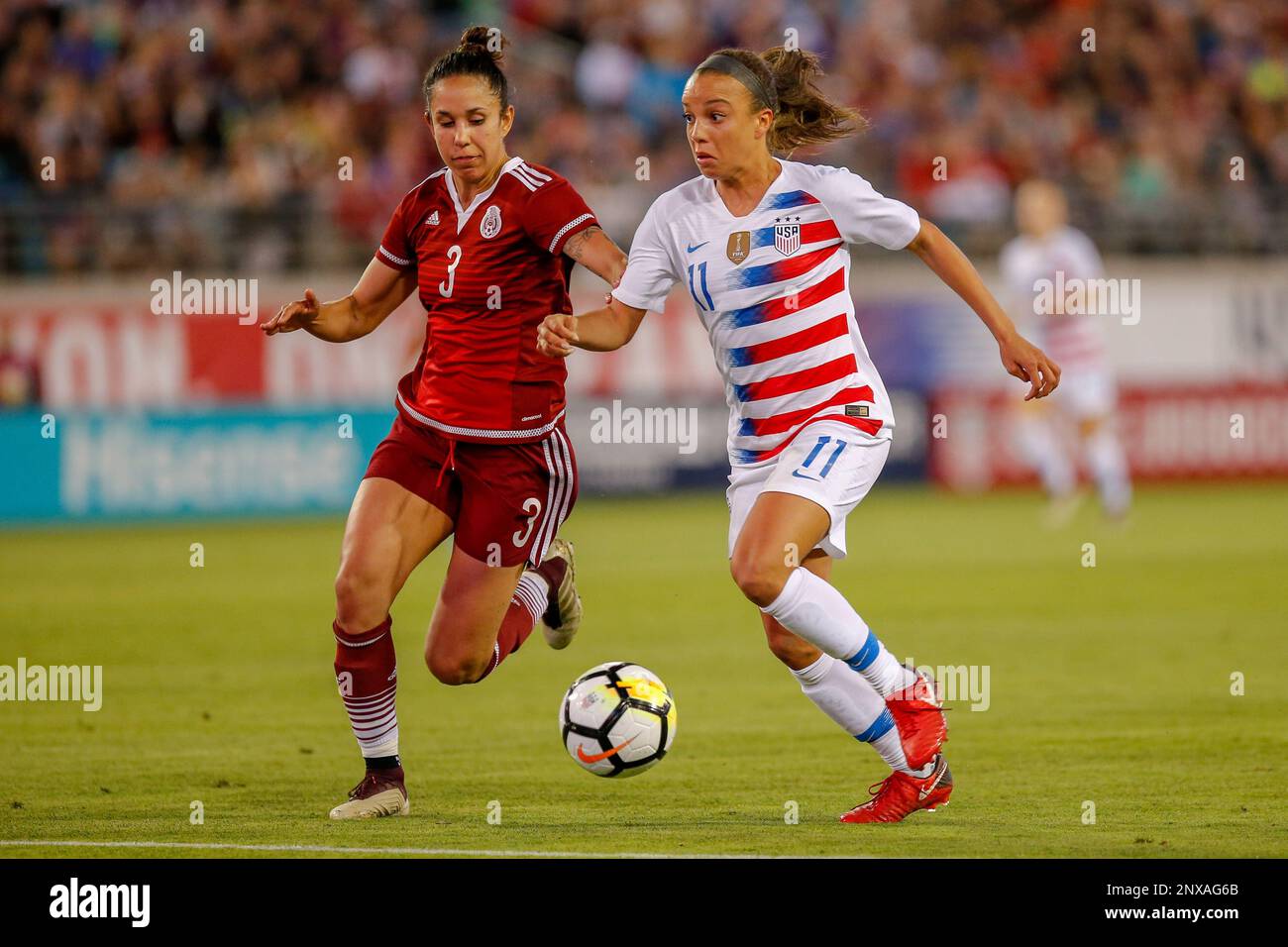 JACKSONVILLE, FL - APRIL 05: United States forward Mallory Pugh (11)  dribbles past Mexico defender Bianca Sierra (3) during the International  Friendly match between the United States and Mexico on April 5,