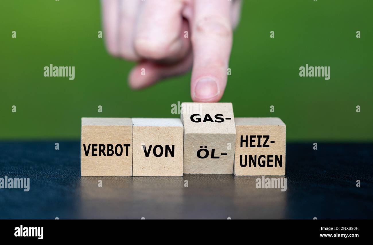 Symbol for the ban of oil and gas heating systems in Germany in the year 2024. Cubes form the German expression 'Verbot von Gas- und Oelheizungen' (ba Stock Photo