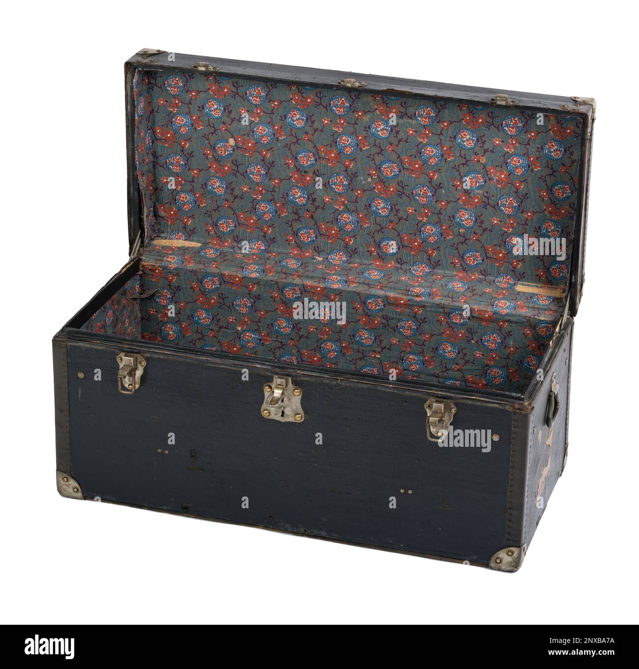 An old fashioned wooden trunk. A black trunk with metal reinforced corners and leather trimmed edges. Stock Photo