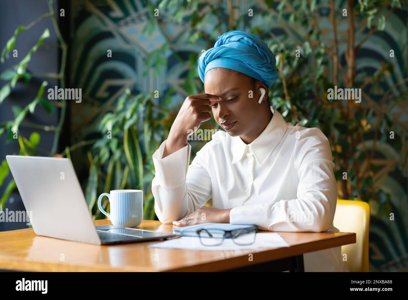 Young black woman tired from studying hi-res stock photography and ...