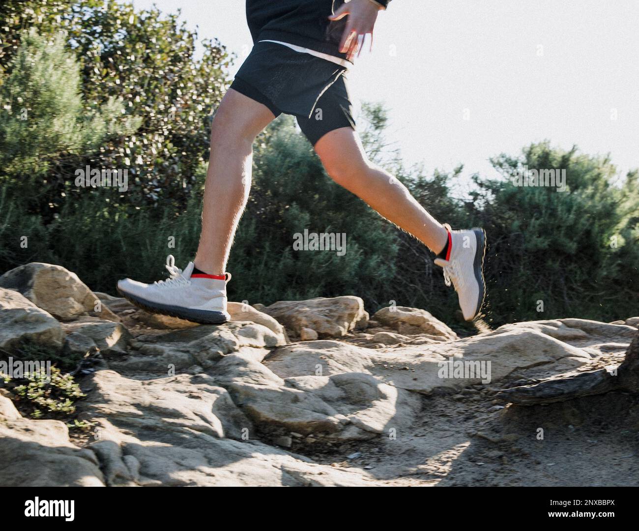 Teenage boy trail running, California, USA Stock Photo