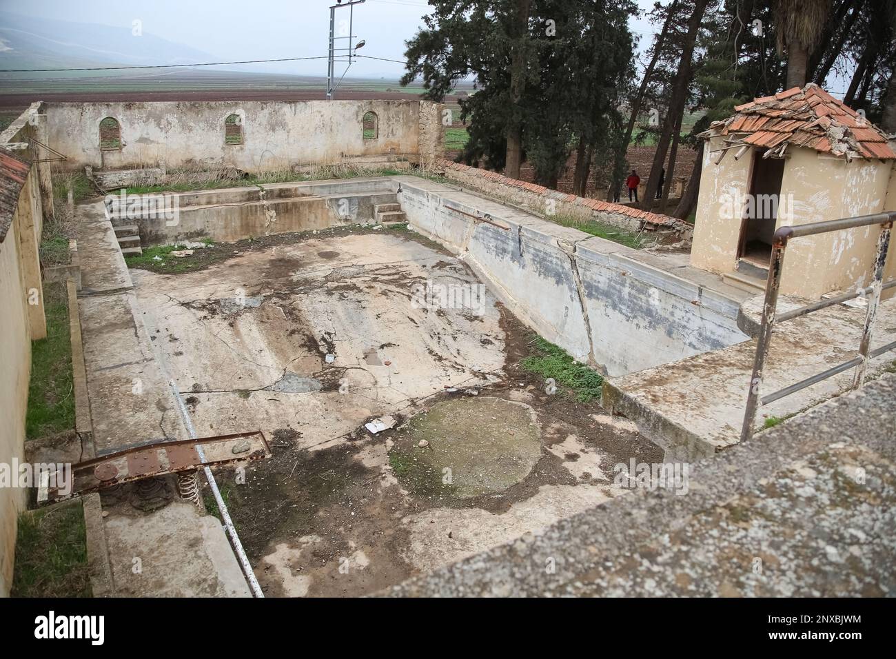 The old mansion pool used in the critical comedy movie Kibar Feyzo by famous Turkish actors Kemal Sunal and Şener Şen. Reyhanlı, Hatay, Turkey. Stock Photo