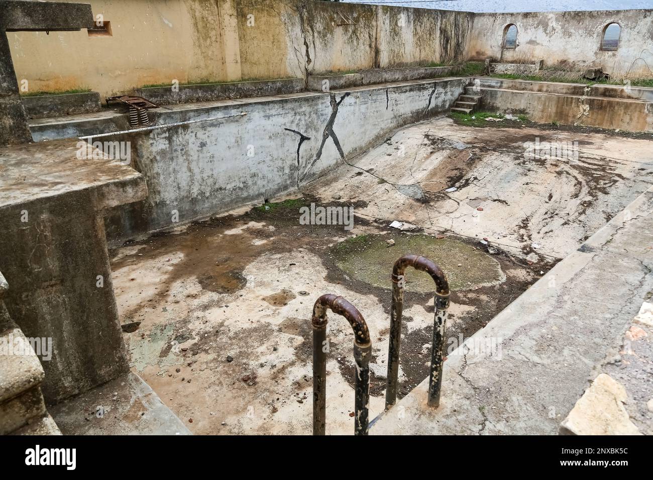 The old mansion pool used in the critical comedy movie Kibar Feyzo by famous Turkish actors Kemal Sunal and Şener Şen. Reyhanlı, Hatay, Turkey. Stock Photo