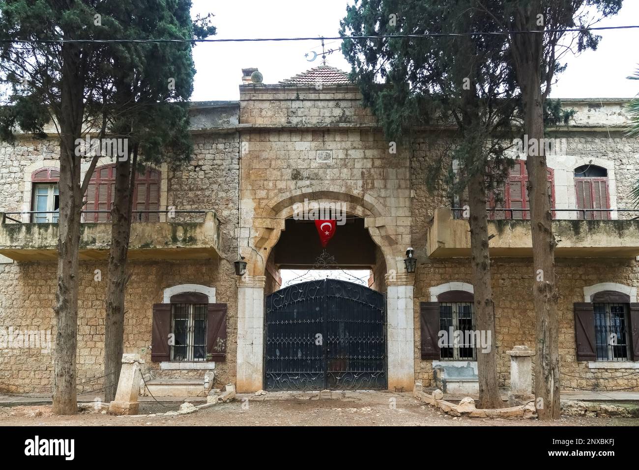 The old mansion used in the critical comedy movie Kibar Feyzo by famous Turkish actors Kemal Sunal and Şener Şen. Reyhanlı, Hatay, Turkey. Stock Photo
