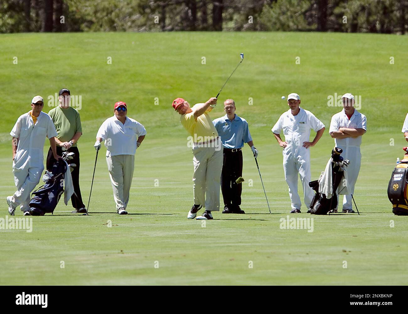 13 Jul. 2006: Businessman Donald Trump hits a ball from the fairway
