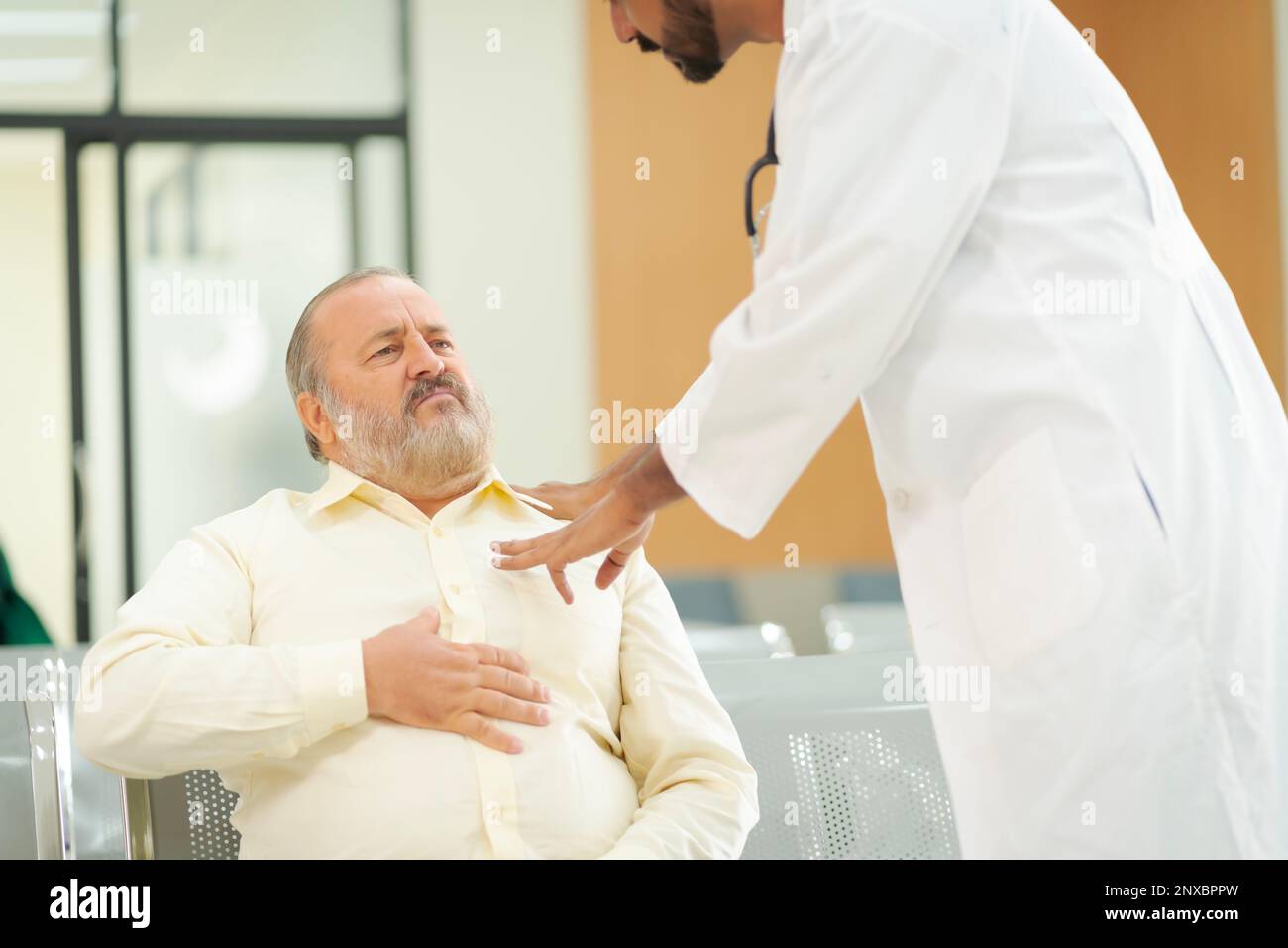 An elderly male patient with high body fat, obesity, sees a doctor at