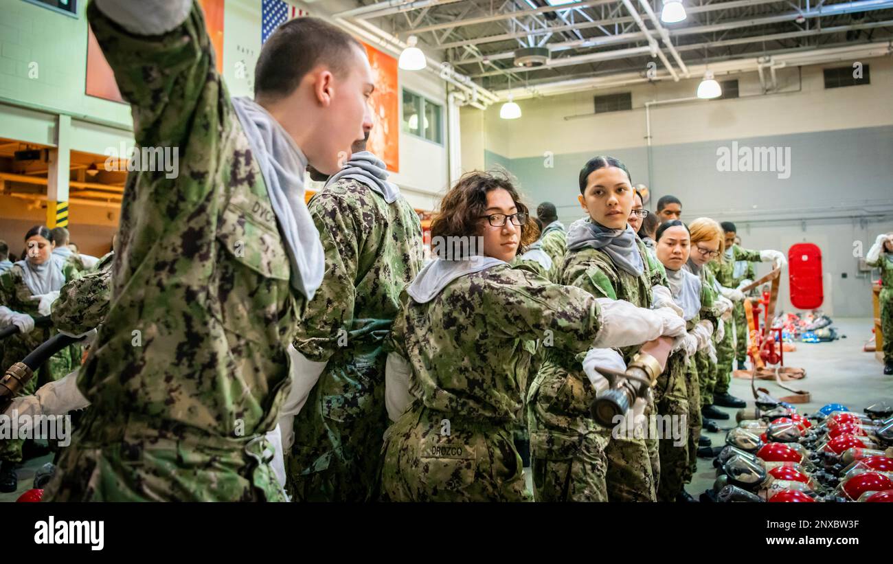 Recruits participate in firefighting training at USS Chief onboard ...