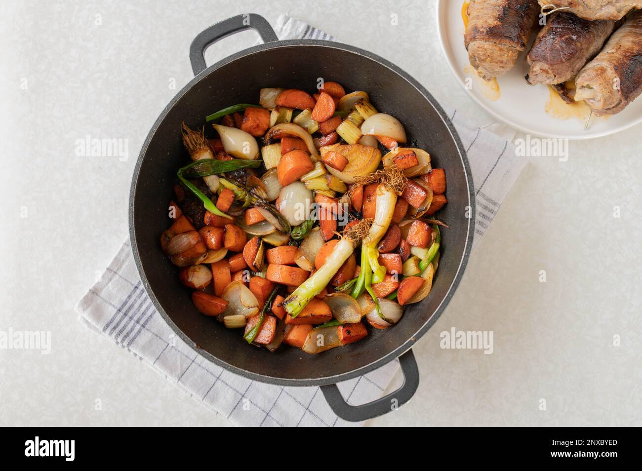 Roasted Mirepoix or root vegetables for making brown sauce or gravy