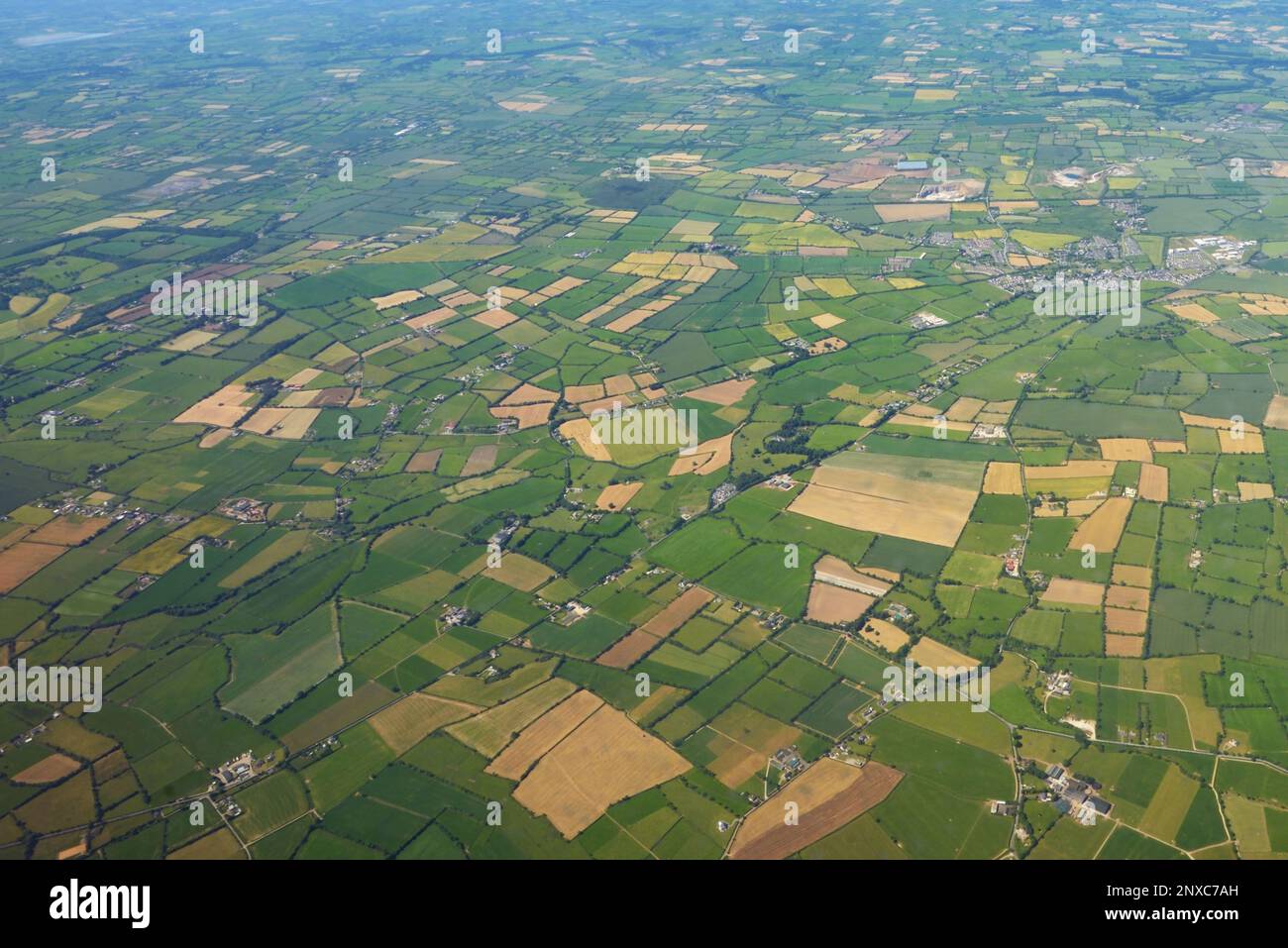 Aerial view of green pattern fields above germany Stock Photo