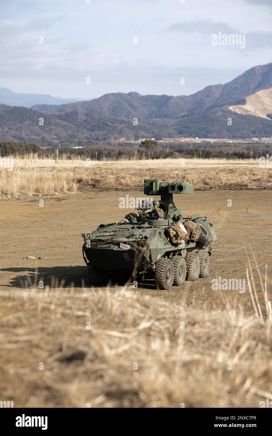 A U.S. Marine with 3d Battalion, 4th Marines, prepares to fire a TOW missile system from a Light Armored Vehicle during Fuji Viper 23.2 at Combined Arms Training Center, Camp Fuji, Japan, Feb. 3, 2023. Fuji Viper provides U.S. Marines operating in Japan with realistic training opportunities to exercise combined arms and maintain proficiency, lethality, and readiness. 3/4 is forward deployed in the Indo-Pacific under 4th Marines, 3d Marine Division as part of the Unit Deployment Program. Stock Photo