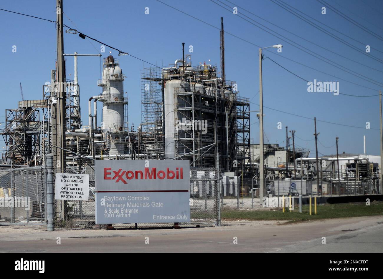 This March 20, 2018 photo shows Exxon Mobil Corp.'s Olefins Plant in Baytown,  Texas. Two days after Harvey hit, some 457 million gallons of stormwater  mixed with untreated wastewater, including oil and