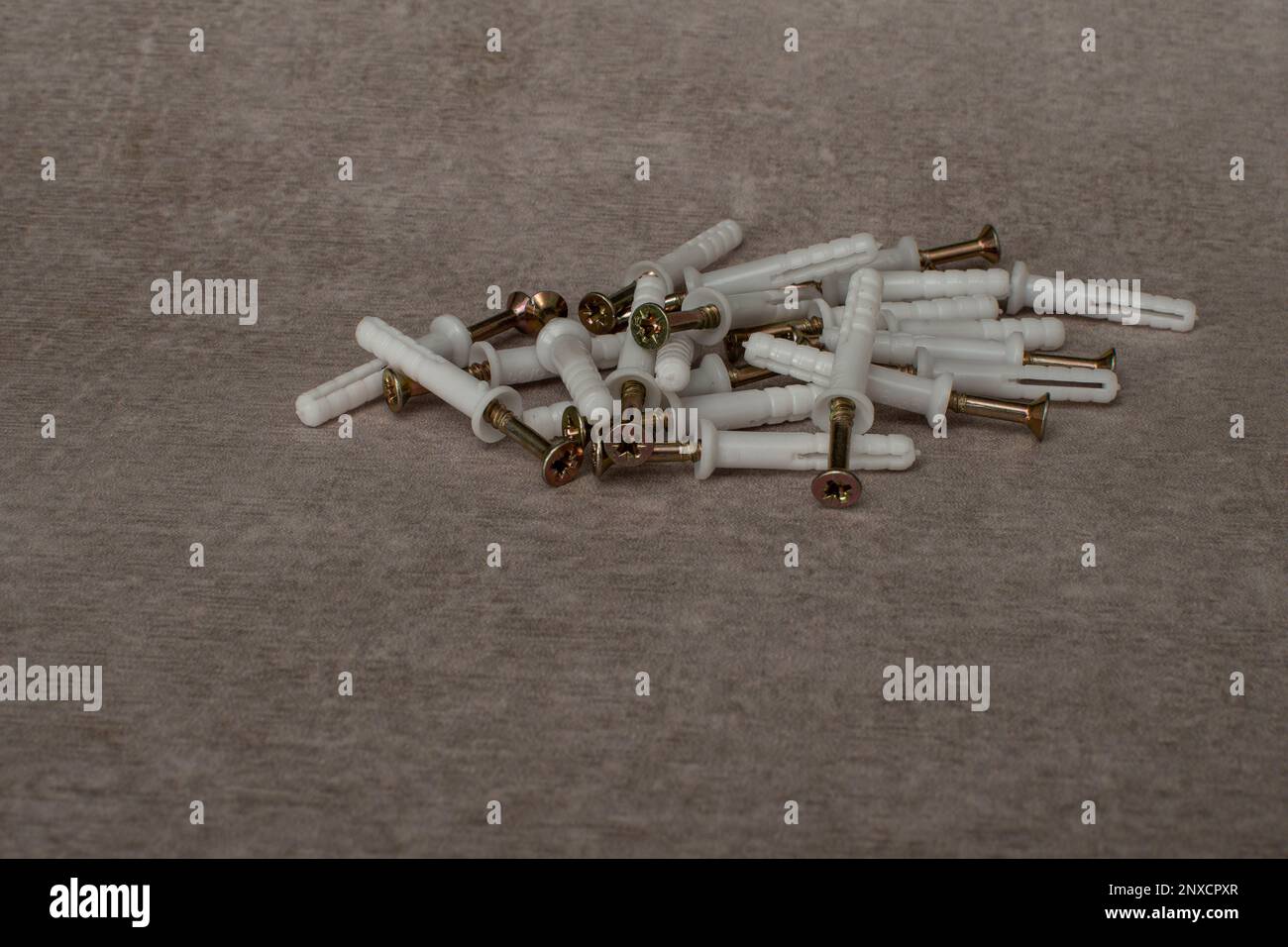 Pile of plastic screw plugs Stock Photo Alamy