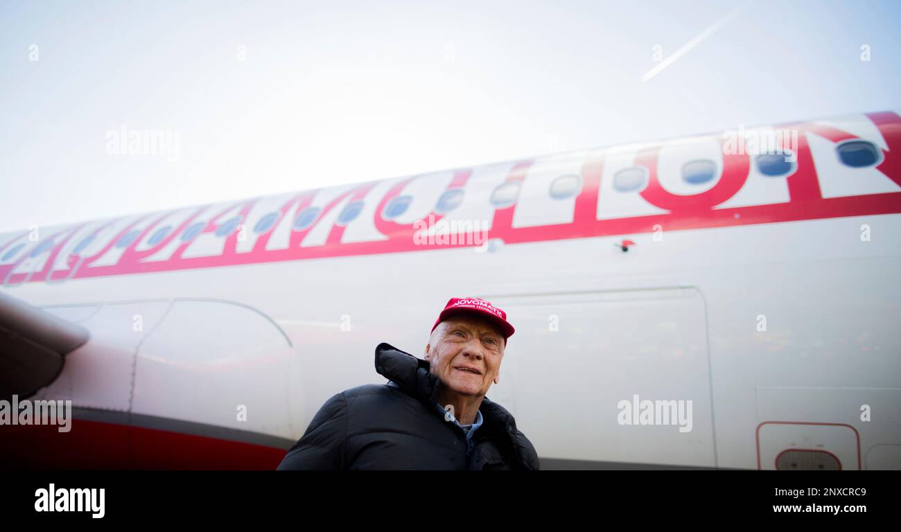 Niki Lauda, manager of the airline 'Laudamotion' and former F1-driver,  poses in front of a 'Laudamotion' Airbus plane at the airport in  Duesseldorf, Germany, Tuesday, March 20, 2018. Budget airline Ryanair says
