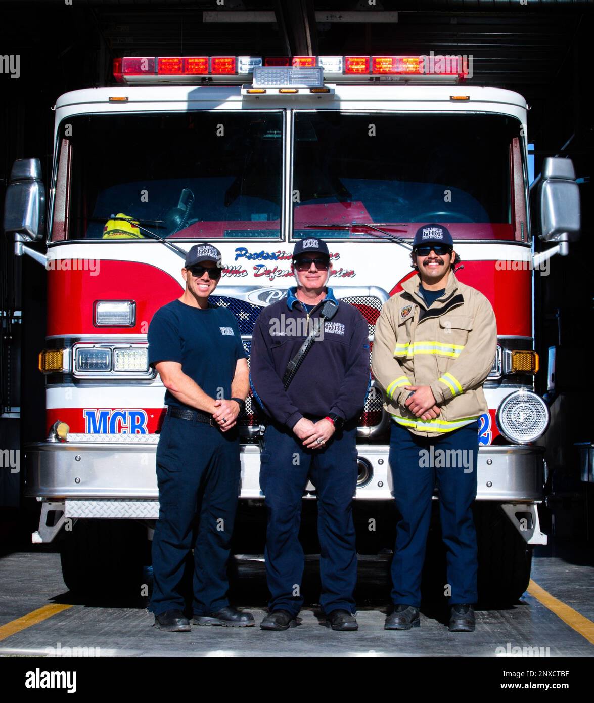 Firefighters Curtis Haug (left), Captain Kevin Crandell (middle), and