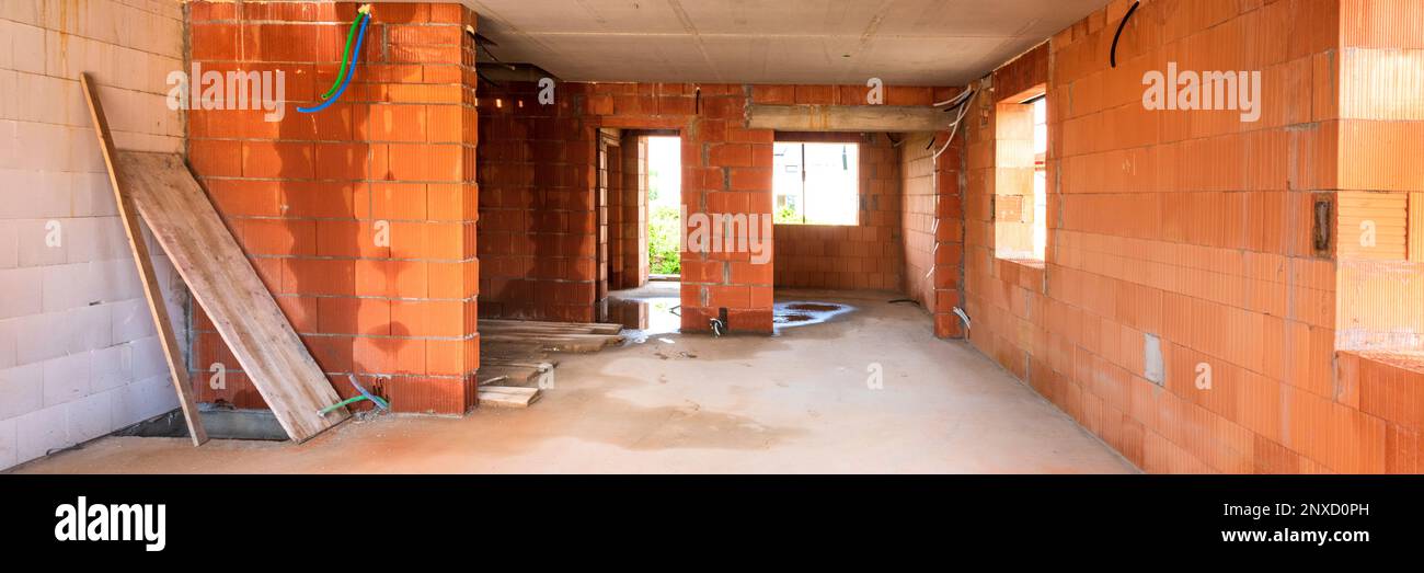 unfinished residential home in construction Stock Photo