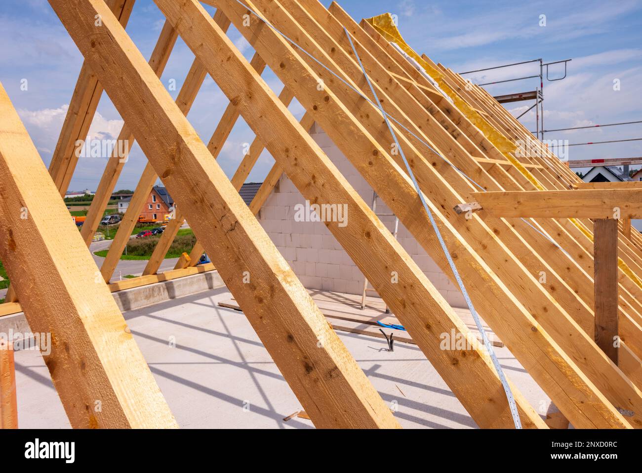 Roof truss in construction of a newly built house Stock Photo