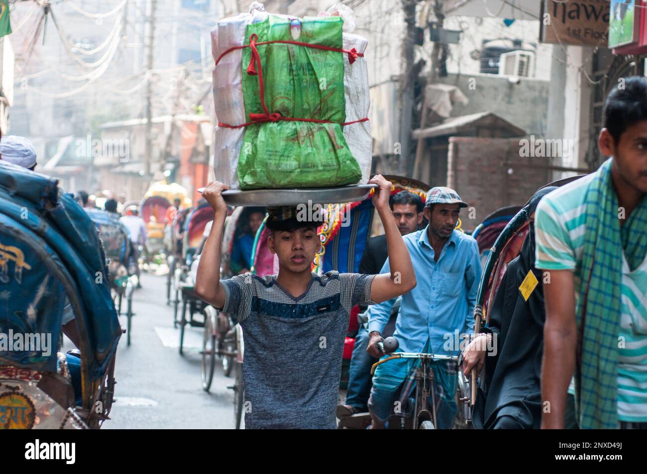 Dhaka city busy street scene and underprivileged people Stock Photo