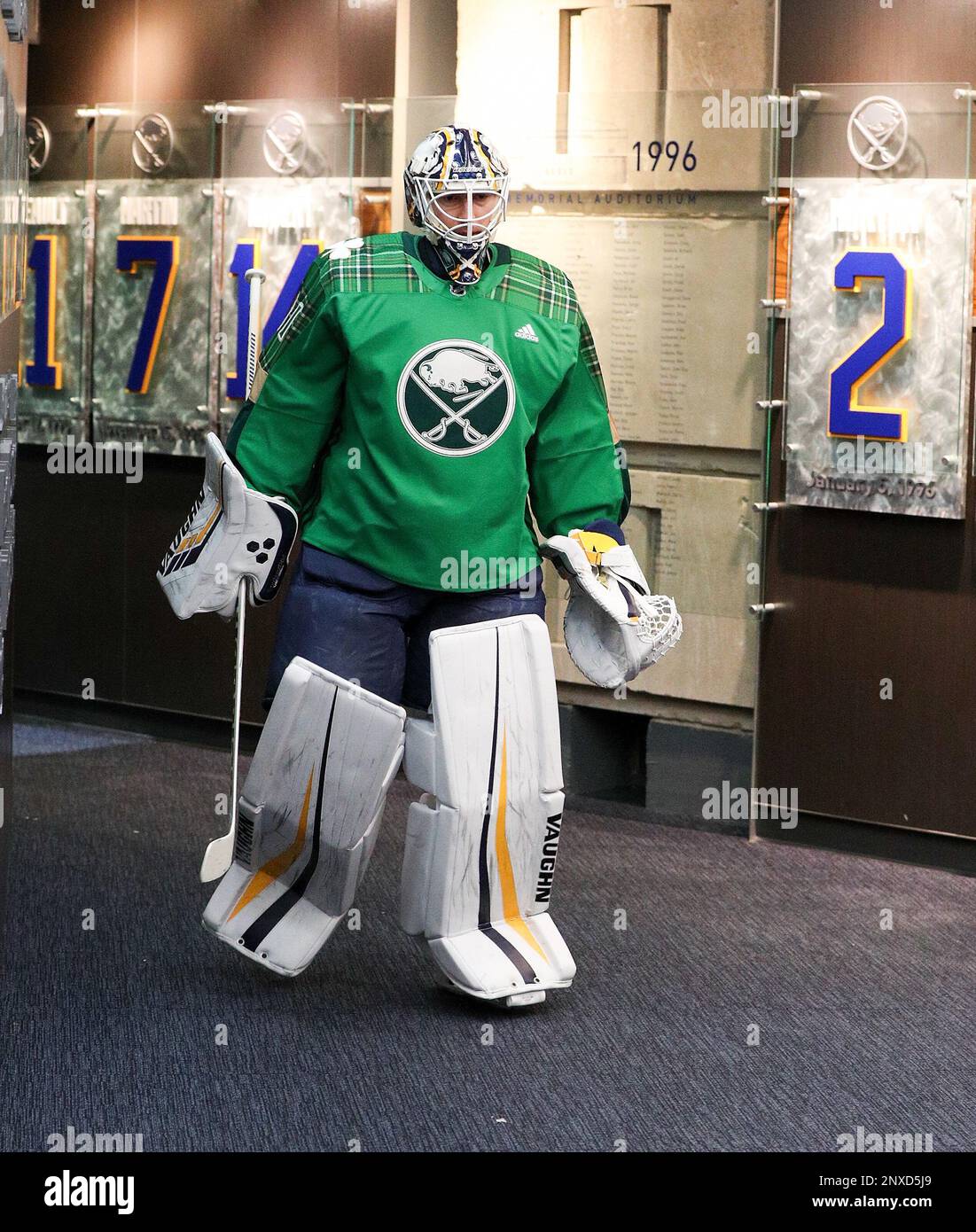 March 17, 2018: Buffalo Sabres goaltender Chad Johnson (31) makes his way  to the Sabres locker room in a special St. Patricks day jersey that will  auctioned off for charity following the