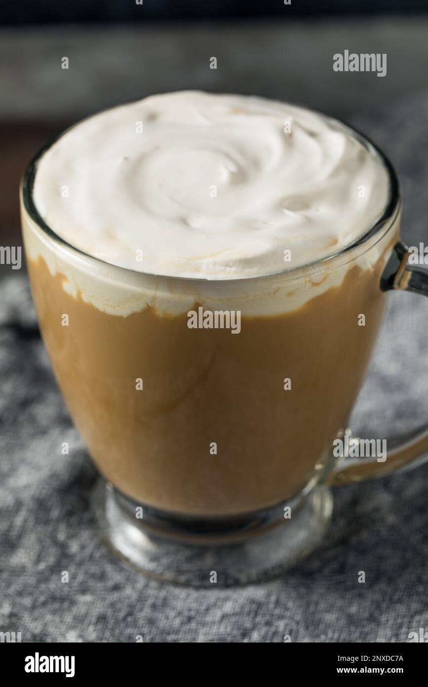 Boozy Refreshing Irish Coffee Cocktail with Whipped Cream Stock Photo