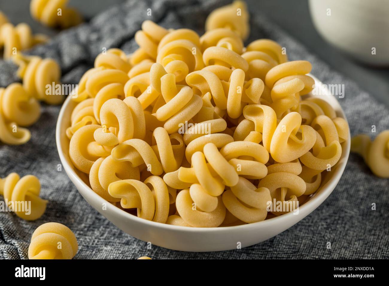 Homemade Dry Trottole Pasta in a Bowl Stock Photo - Alamy