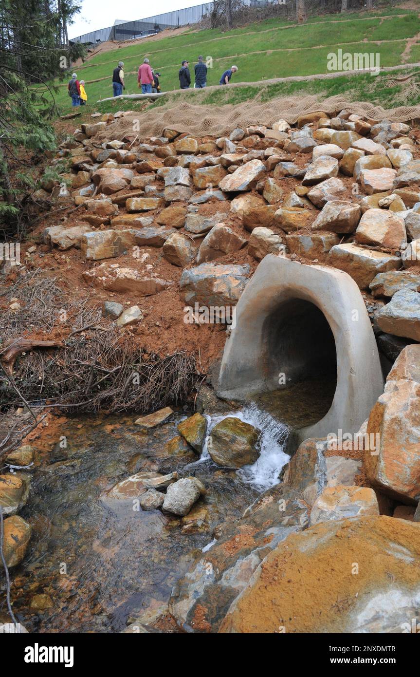 Creek water flows through the repaired Little Wolf Creek culvert while