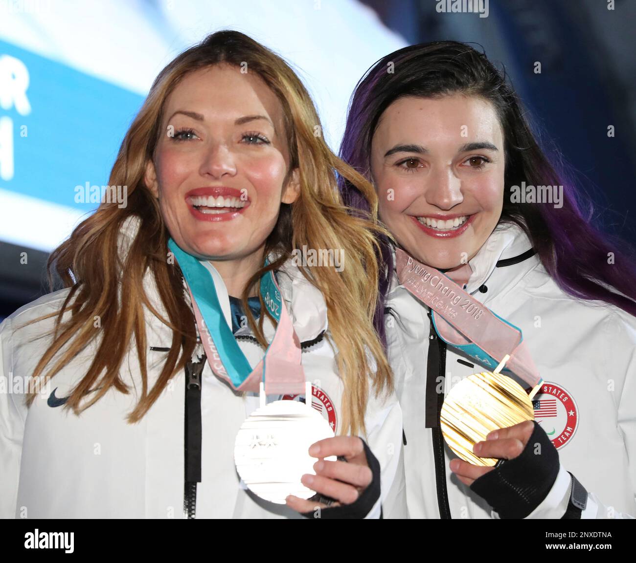 U.S. Amy PURDY(L), silver, and Brenna HUCKABY, gold, pose for
