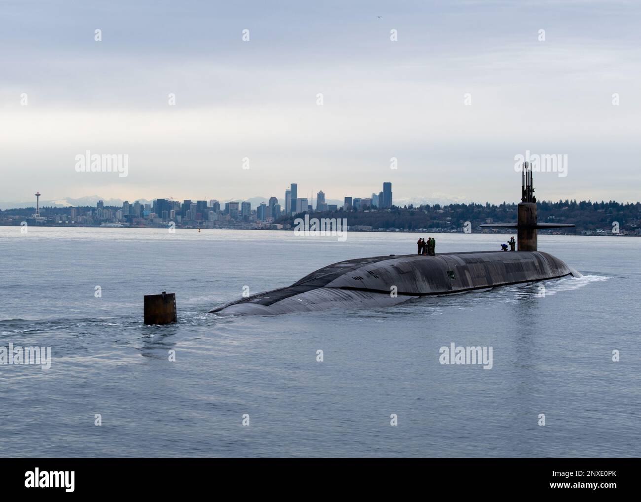 230209-N-ED185-1316  PUGET SOUND, Wash. (Feb. 9, 2023) The Ohio-class ballistic missile submarine USS Louisiana (SSBN 743) transits Puget Sound past the Seattle skyline following a 41-month engineered refueling overhaul at Puget Sound Naval Shipyard and Intermediate Maintenance Facility, February 9, 2023. Louisiana is one of eight ballistic-missile submarines stationed at Naval Base Kitsap-Bangor, providing the most survivable leg of the strategic deterrence triad for the United States. Stock Photo
