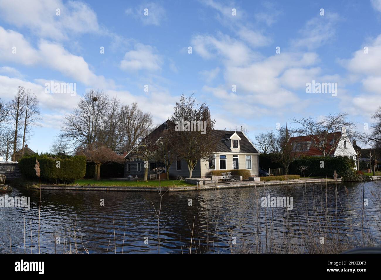 Broek in Waterland, Netherlands. February 2023. The canals and antique wooden houses in Broek in Waterland. High quality photo Stock Photo