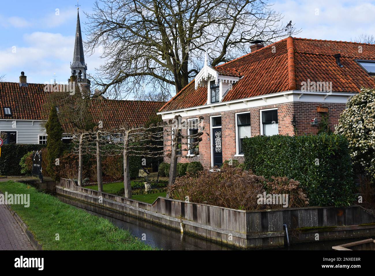 Broek in Waterland, Netherlands. February 2023. The canals and antique wooden houses in Broek in Waterland. High quality photo Stock Photo