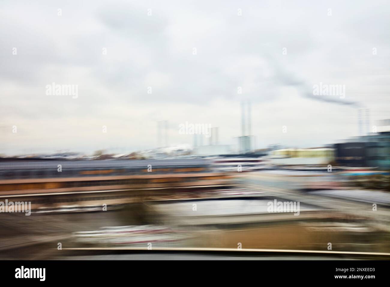 Passing by industrial area scenery motion blur Stock Photo