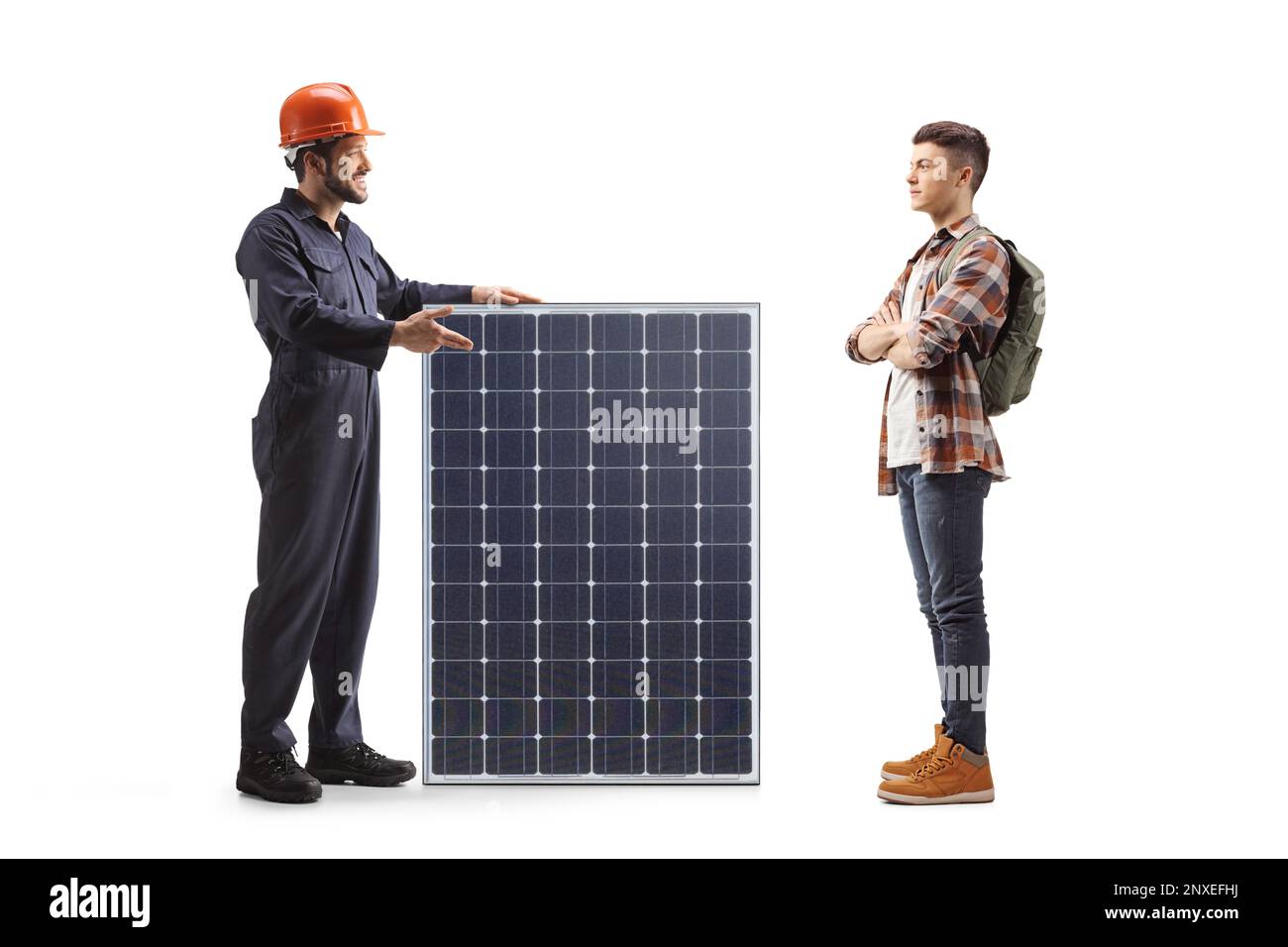 Factory worker explaining about a solar panel to a male student isolated on white background Stock Photo