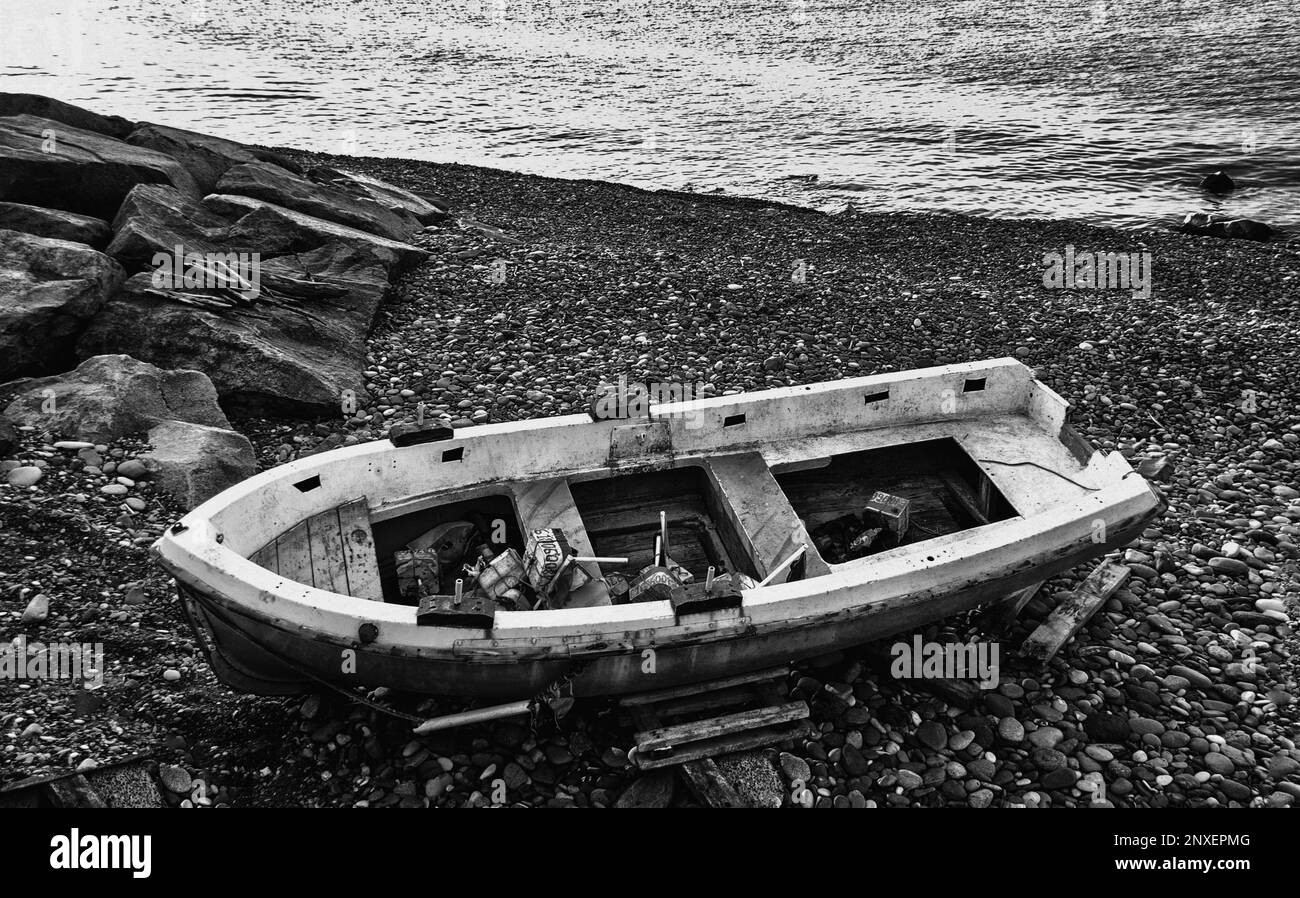 Old fisherman boat on the beach Stock Photo - Alamy