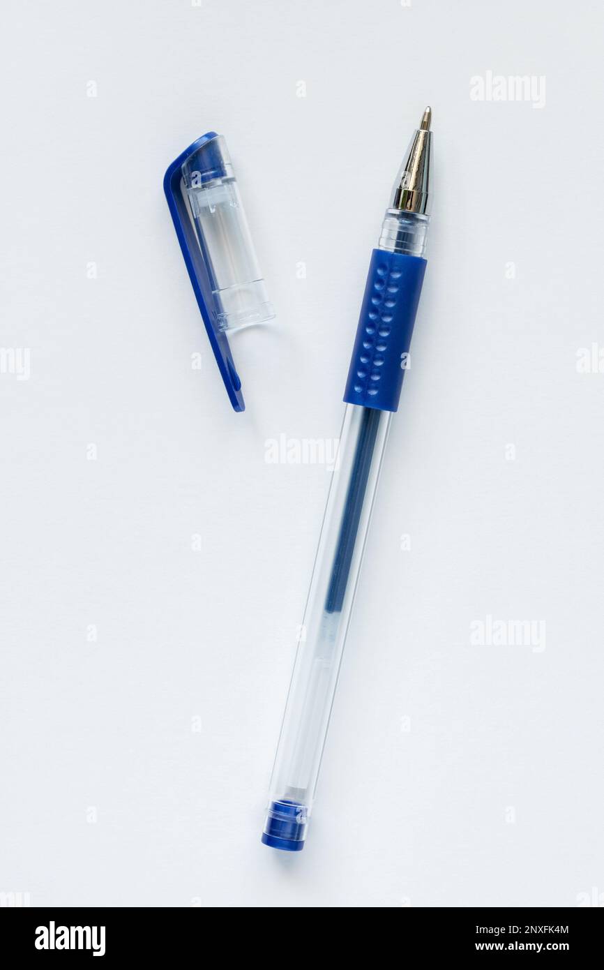 Blue gel pen with open pen cap on white background Stock Photo