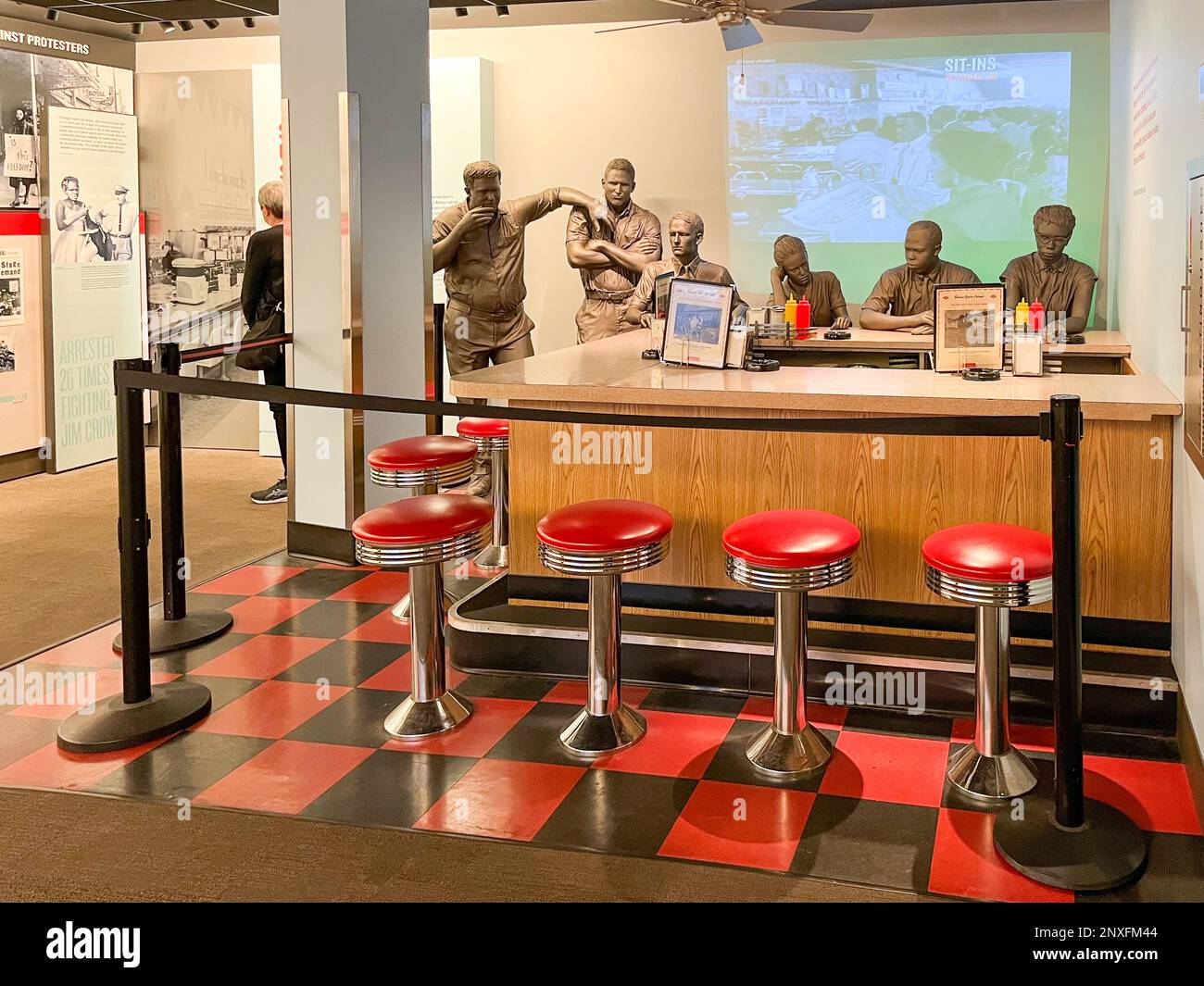 Interior of the National Civil Rights Museum, Lorraine Motel, Memphis, Tennessee, showing student lunch counter sit in demonstration. Stock Photo