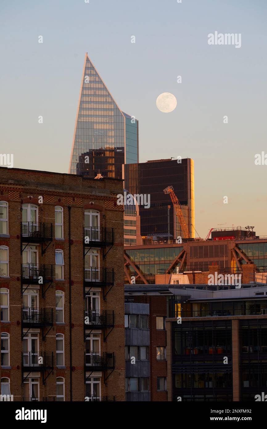 Moon over London skyline, London, England, GB Stock Photo