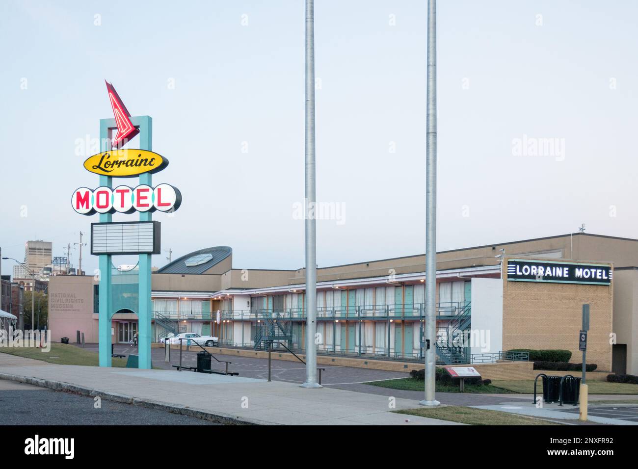 Exterior of The Lorraine Motel, National Civil Rights Museum, Memphis Tennessee. Showing lighted neon sign, motel rooms, and entrance with parking lot Stock Photo