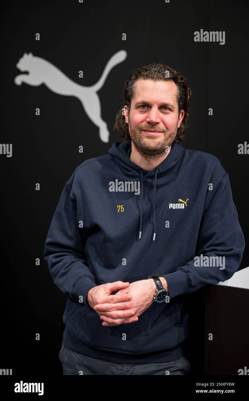 Herzogenaurach, Germany. 01st Mar, 2023. Portrait of Arne Freundt, CEO at  Puma, with Puma logo in the background. The eternal competition between the  sporting goods manufacturers in the Franconian province has a new punch  line: Puma has ...