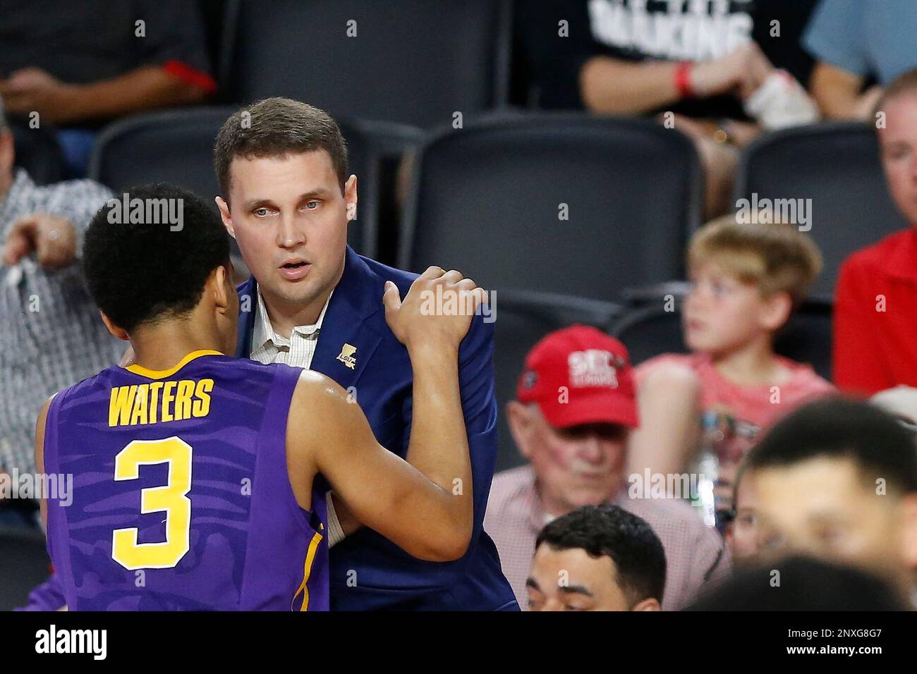 LSU guard Tremont Waters (3) speaks with LSU coach Will Wade in the