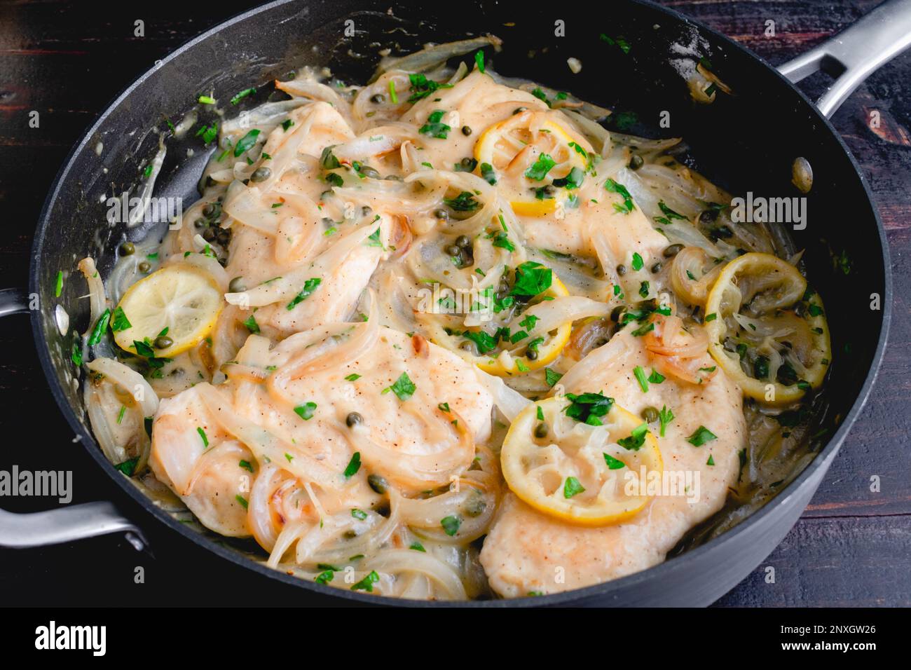 Chicken Piccata Cooked in a Large Saute Pan Chicken cutlets and lemon