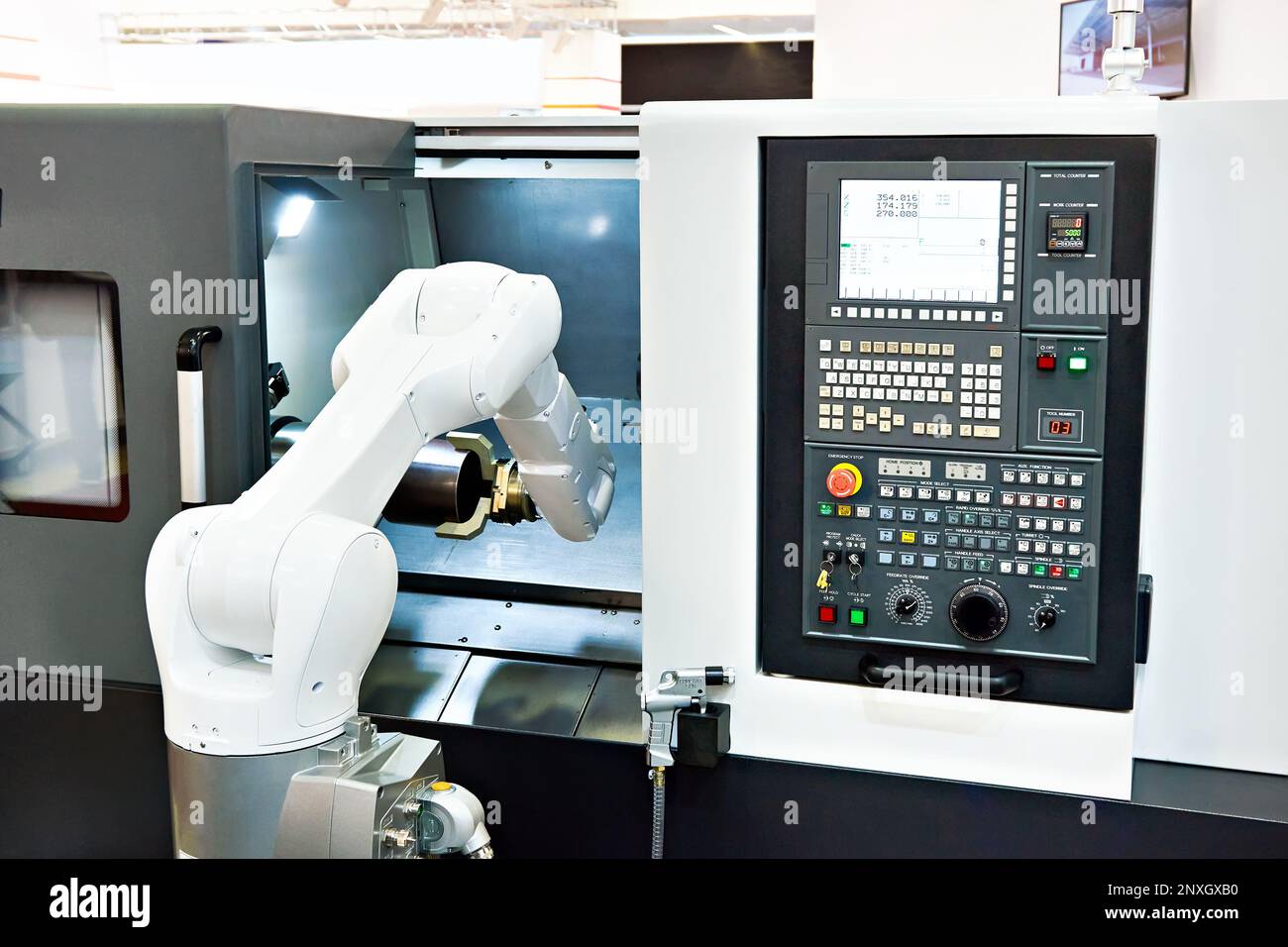 Standard universal industrial robot with part Stock Photo Alamy