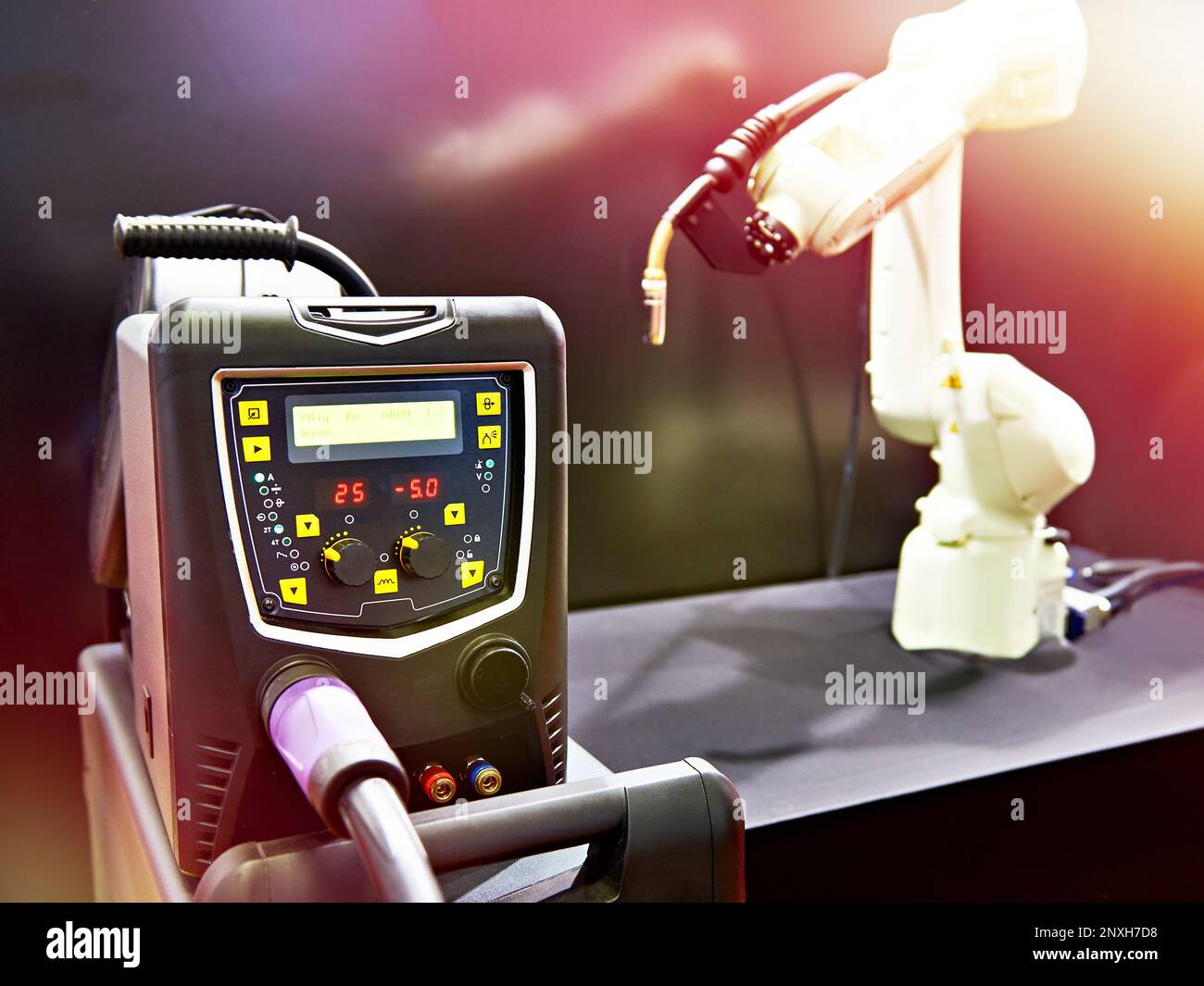 Modern welding machine inverter and robot manipulator Stock Photo
