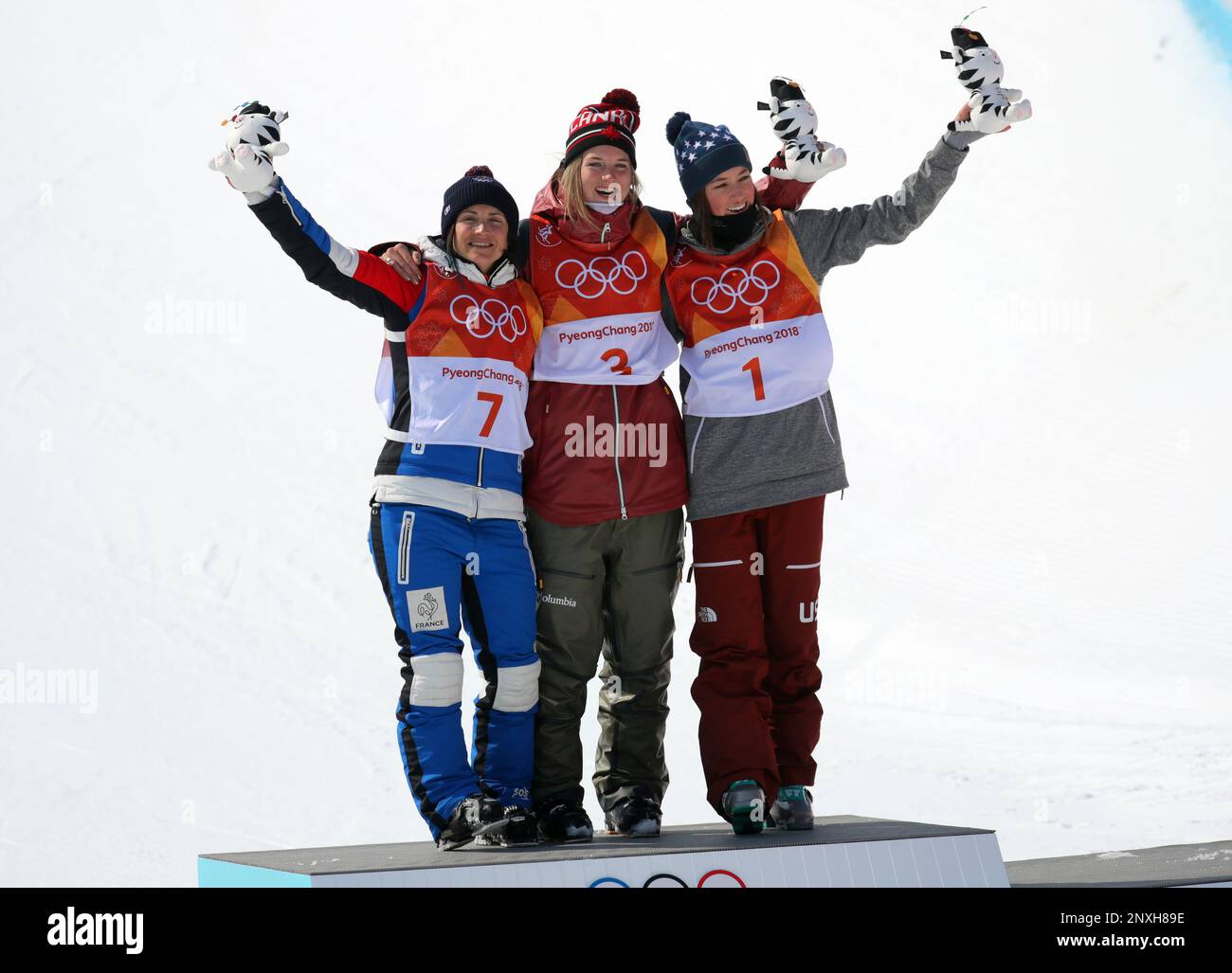 L to R) France's Marie MARTINOD, silver, Canada's Cassie SHARPE, gold, and  U.S. Brita SIGOURNEY celebrates on the podium of the Freestyle Skiing  Ladies' Ski Halfpipe of the PyeongChang Olympic Winter Games