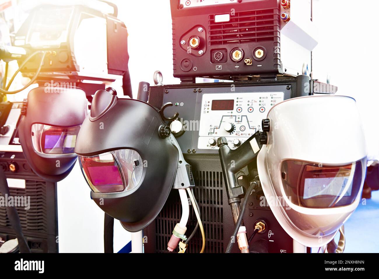 Inverter devices for welding and protective masks Stock Photo