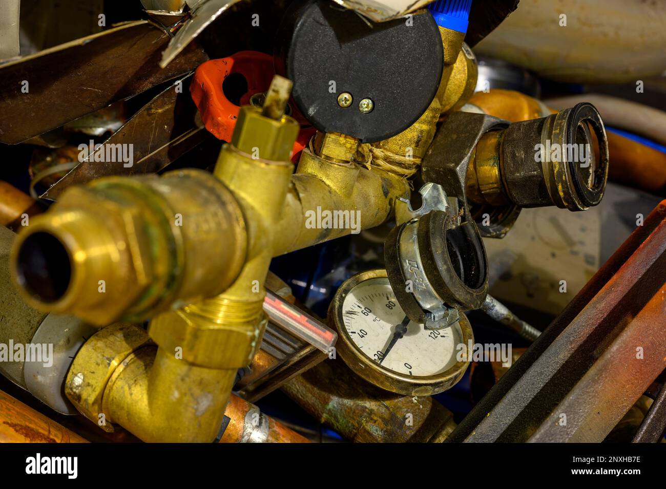 Waste with various components of an old heating system after renovation