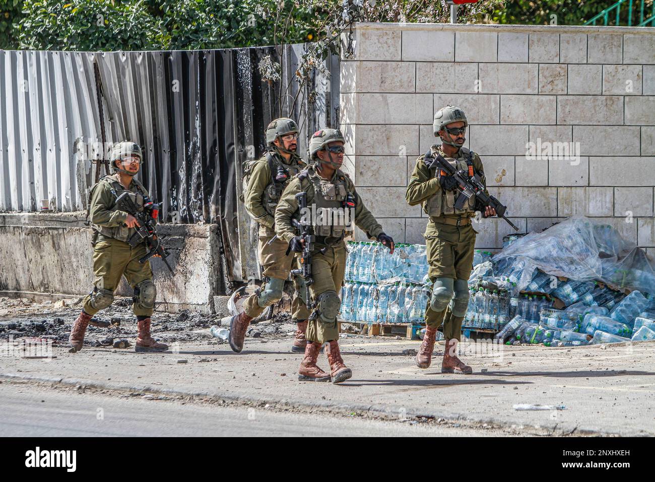 Israeli Soldiers Patrol The Streets In The Town Of Hawara, South Of ...