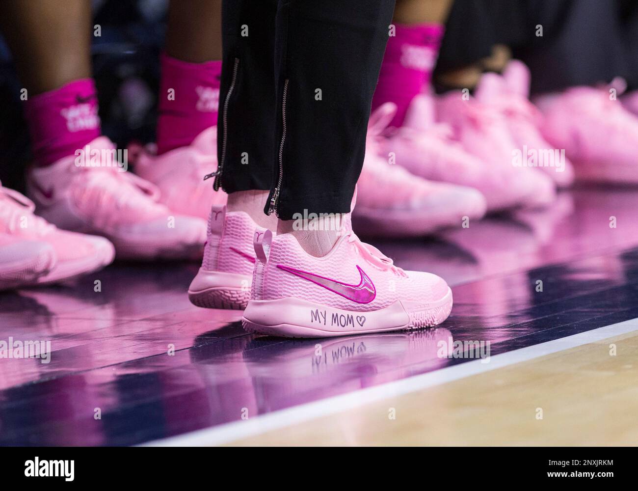 Pink shoes in ncaa deals