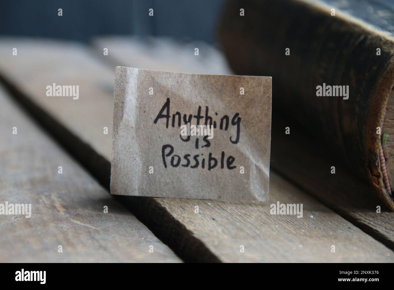 Anything is Possible card. The inscription on the tag. Vintage style. Motivational quotes. Stock Photo
