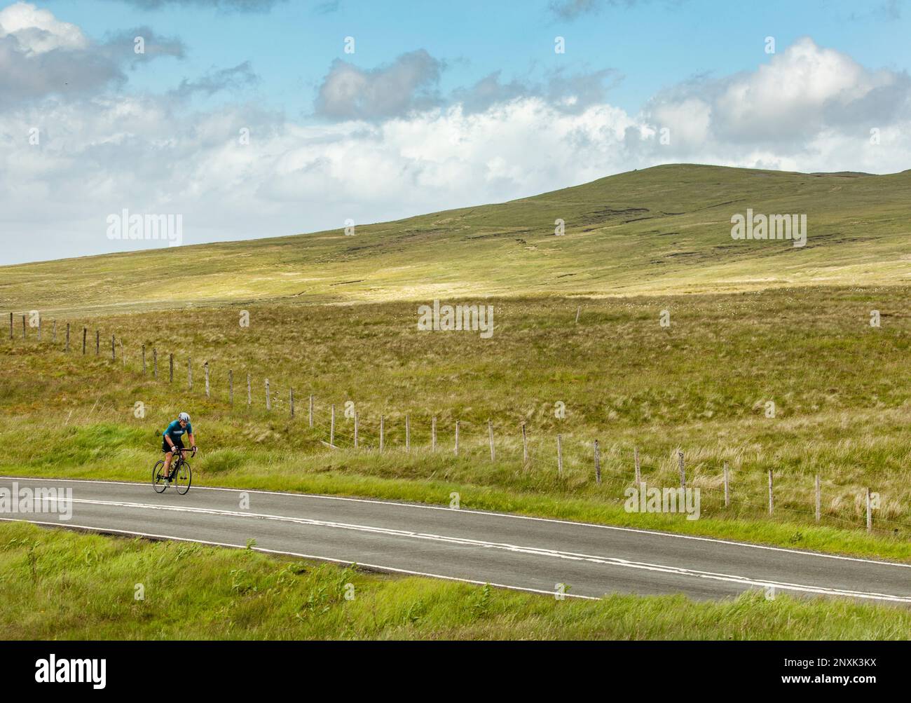 Sea to Sea Cyclists approaching Hartside Pass Summit, near Alston,North Pennines, Cumbria Stock Photo
