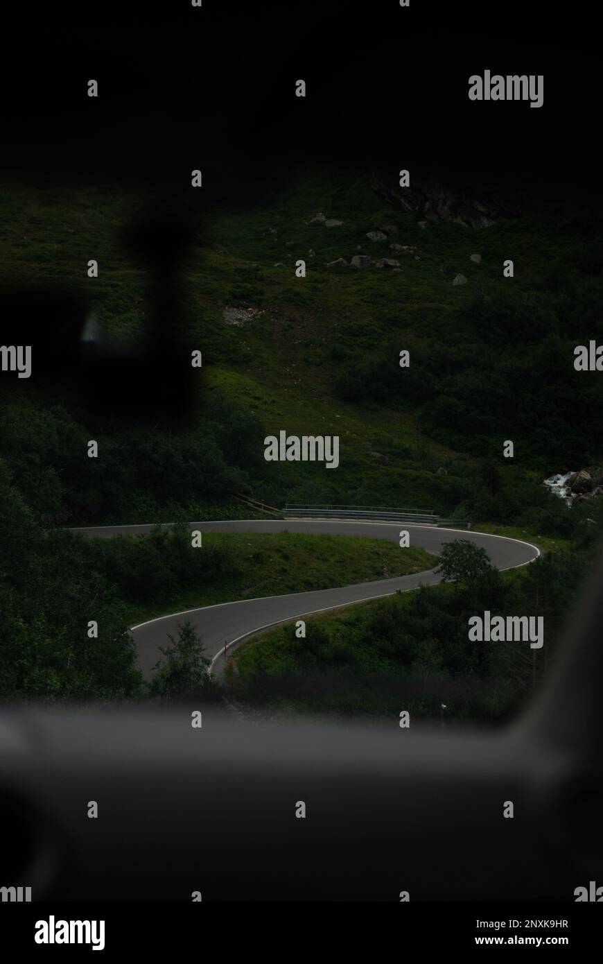 Car on the road in alps hi-res stock photography and images - Alamy